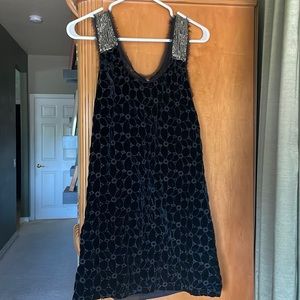 Gorgeous 1920s velvet mini dress with silver beading accents.